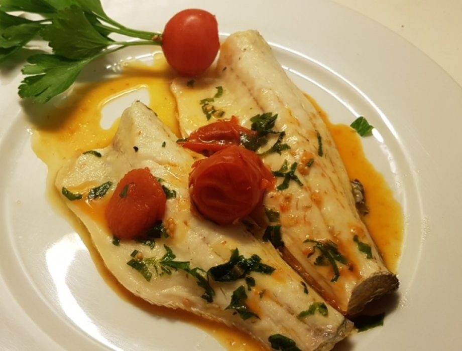 SEA BASS FILLET IN TOMATO STEW, CAPERS AND OLIVES AND FISH SMOKE